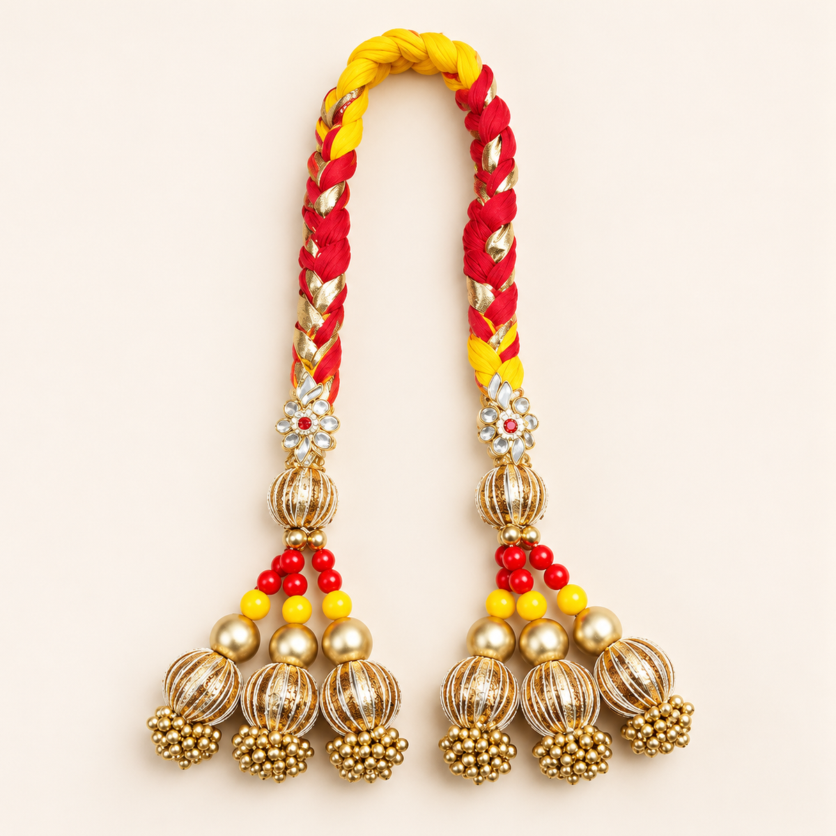 Traditional Mayra Bhaat Napni Mala with red braided detailing, golden embellishments and decorative tassels for Rajasthani wedding rituals