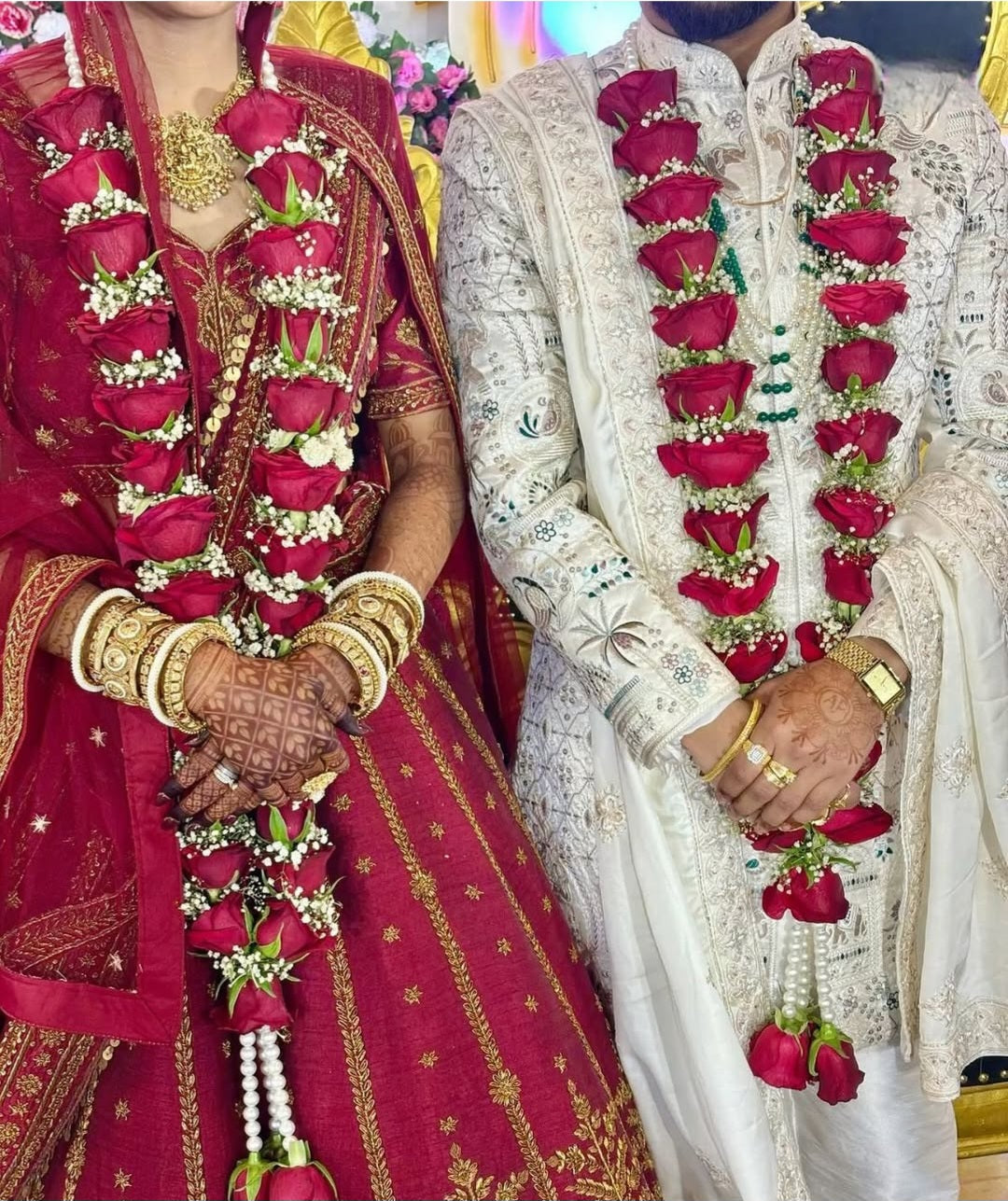 Close-up of red roses arranged in a traditional Indian wedding jaimala for dulha dulhan
