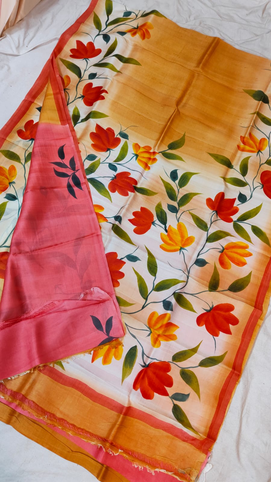 Red orange floral and long printed border Bishnupuri silk saree