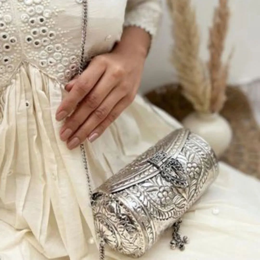 Royal silver brass clutch bag with long sling chain