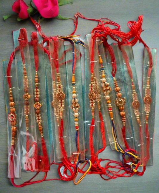 Elegant designer Kundan Stone Pearl Glitter multicolor 12 Rakhi combo set