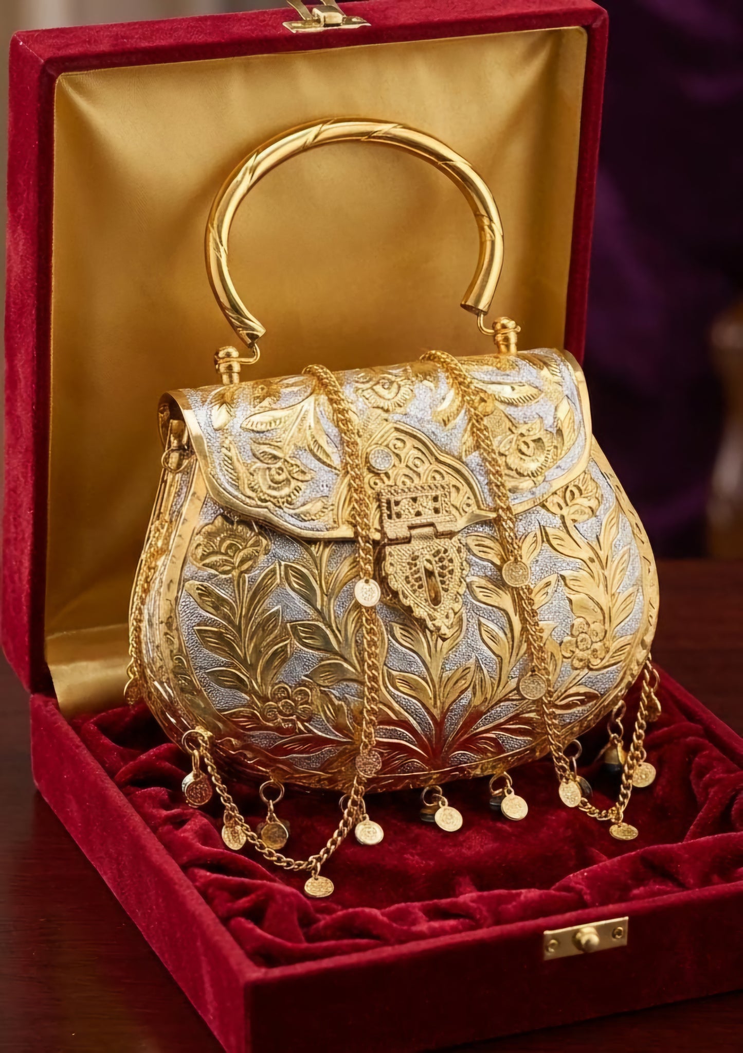 Dual-tone heritage brass clutch with antique silver and gold detailing