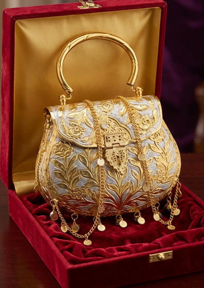 Dual-tone heritage brass clutch with antique silver and gold detailing