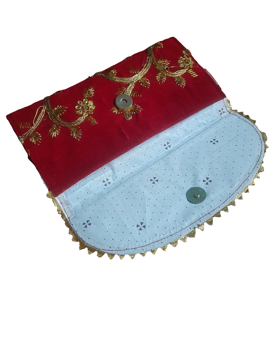 Intricate threadwork on a decorative fabric shagun lifafa for weddings and celebrations
