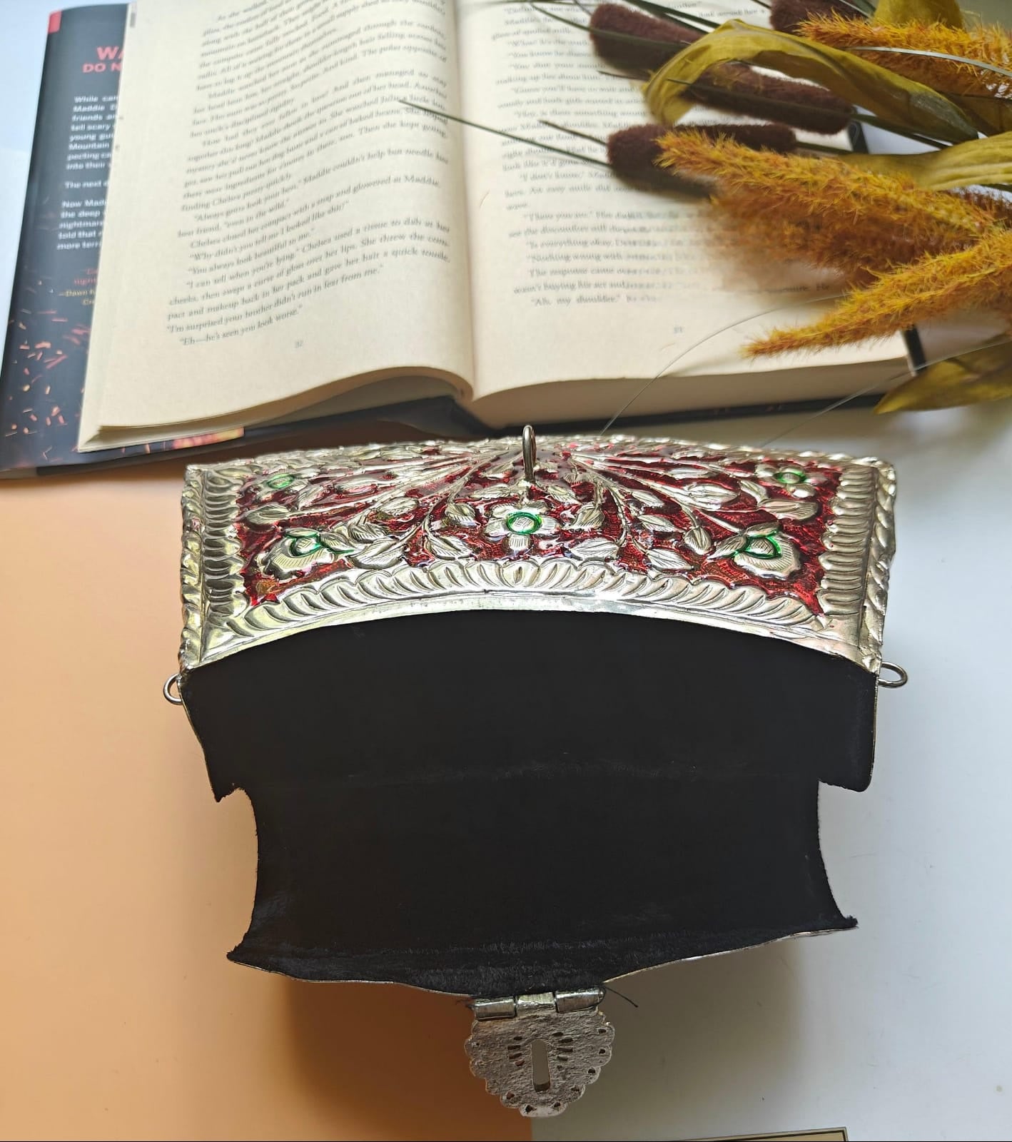 Floral brass ethnic bridal purse with traditional Meena detailing