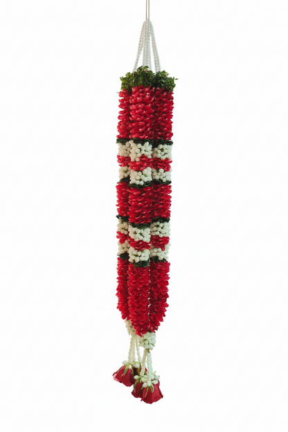 Close-up of rose and mogra flowers in a traditional wedding garland for shaadi varmala exchange