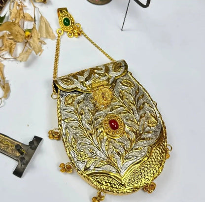 Ghungru Bliss golden clutch with elegant traditional detailing