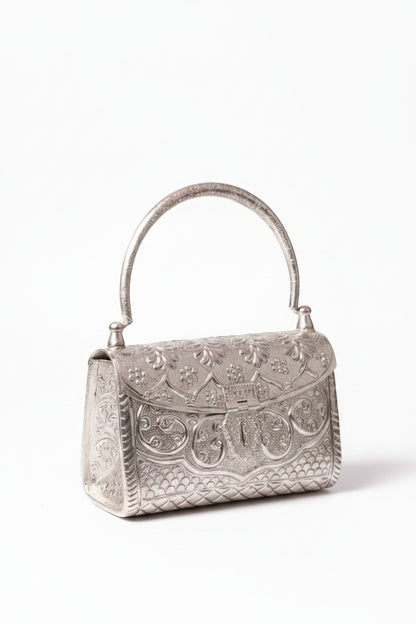 Handcrafted silver clutch purse with intricate designer detailing