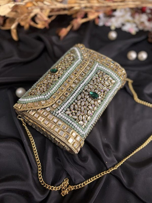 Elegant handcrafted Jadau work brass metal clutch bag