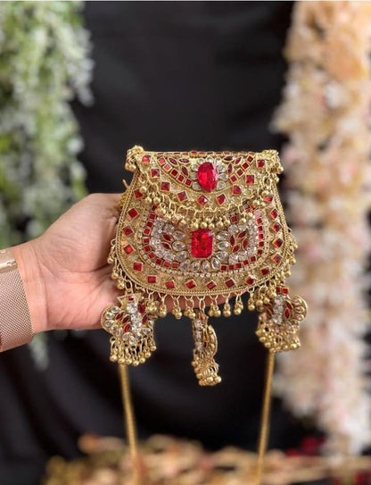 Kundan party wear clutch embellished with sparkling gemstones