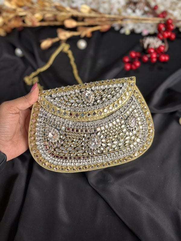 Kundan work clutch bag with elegant traditional detailing