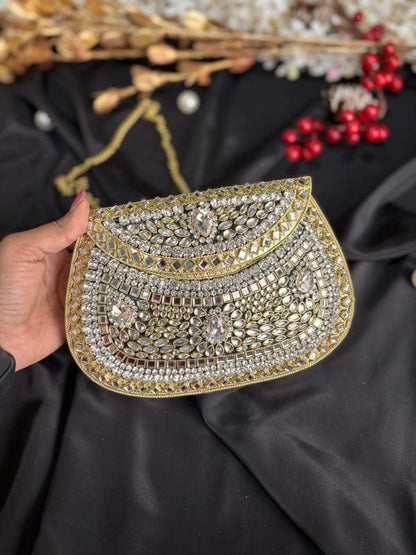 Kundan work clutch bag with elegant traditional detailing