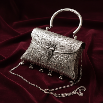 Maharani style elephant brass clutch styled for an ethnic wedding