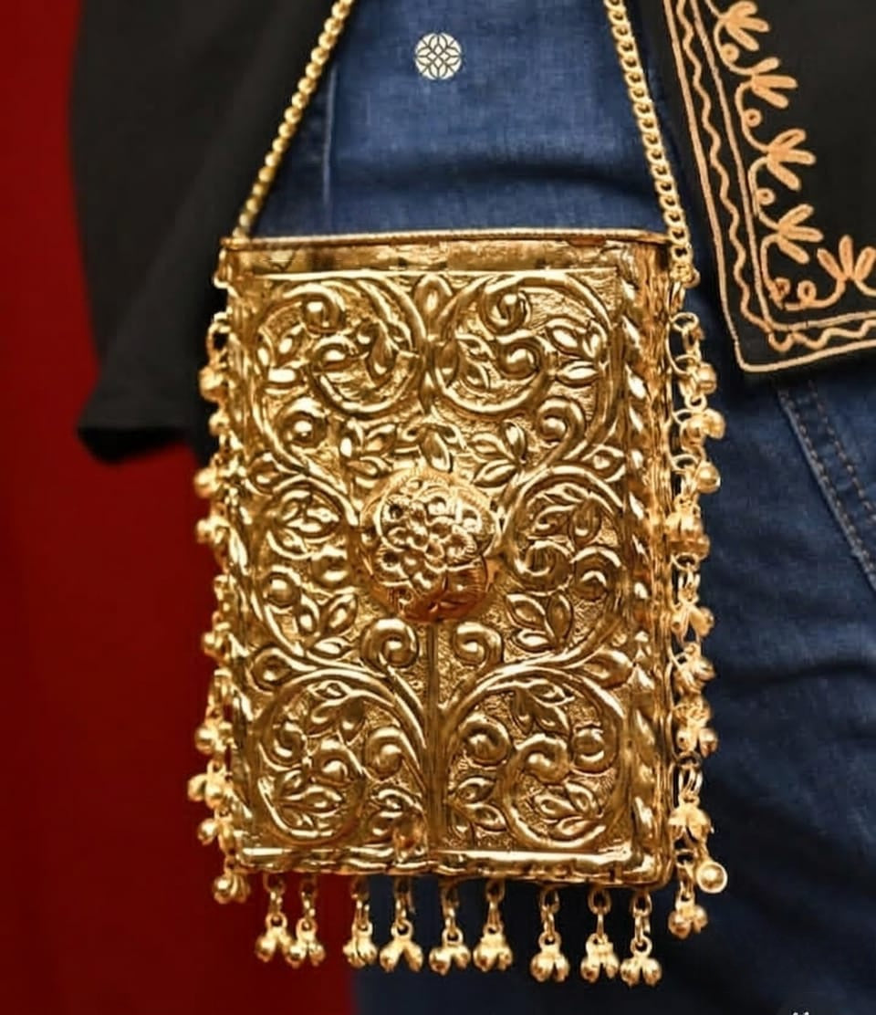 Noor Mahal brass designer mobile clutch with Ghoongroo detailing