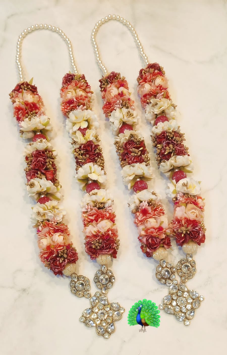 Pearl-embellished varamala set for bride and groom wedding rituals