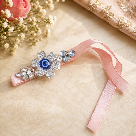 Handcrafted pink Evil Eye stone Rakhi for brother