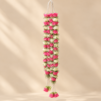 Pearl string tassels and pink rose buds on a pink and white dulha dulhan wedding mala
