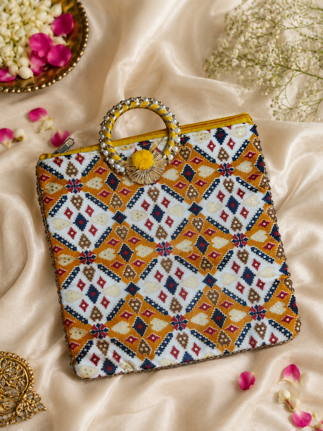 Printed gift bag with circular chudi handles for traditional Indian gifting