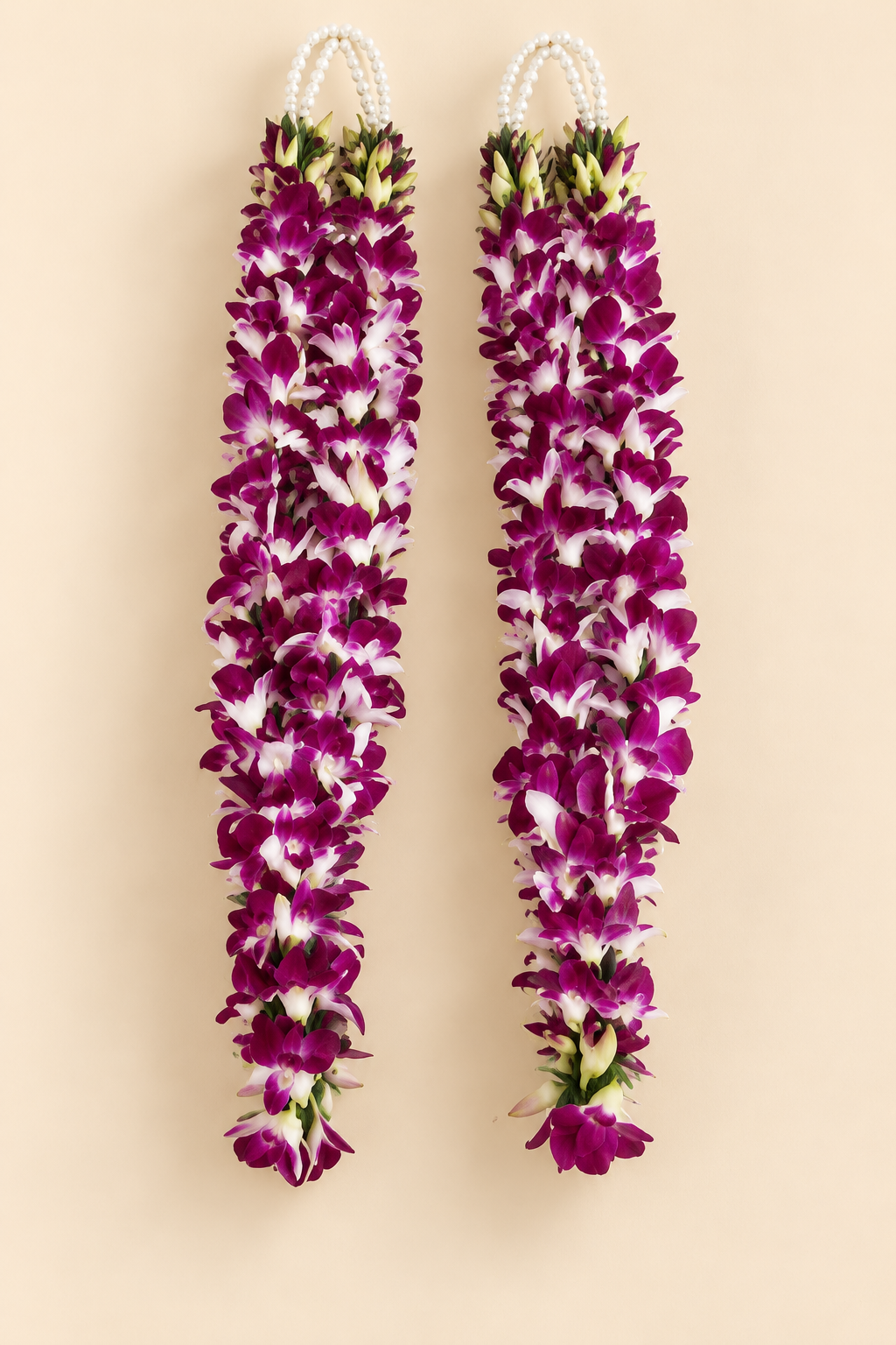 Close-up of purple and white flowers on a traditional Indian wedding garland for shaadi varmala exchange