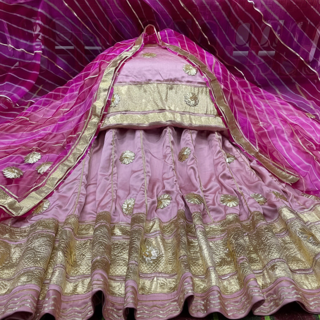 Close-up of Lehriya pattern on Rajputi satin suit