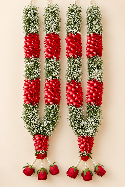 Red rose and white baby’s breath varmala set with hanging rose buds for dulha dulhan wedding jaimala ceremony