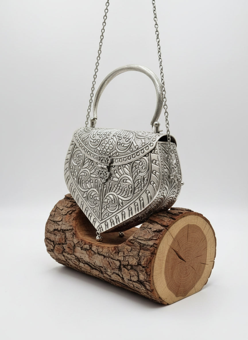 Maharani Regal Silver Dome Clutch