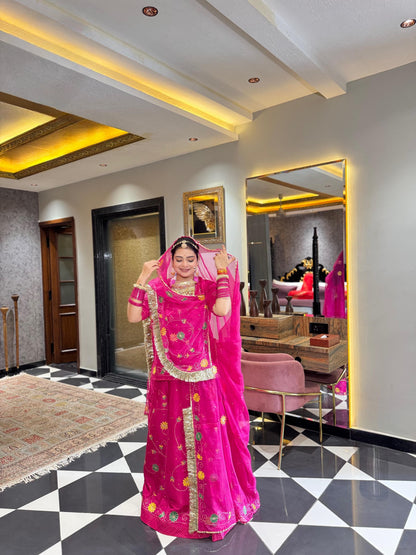 Rani Pink Upada Silk Rajputi Poshak – Hand Painted Aari Work Designer Lehenga with Heavy Odhani