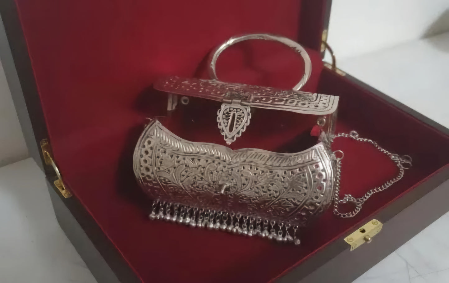 Fancy Ghungroo Pattern Silver Brass Clutch