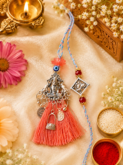 Lakshmi Ganesha Divine Bhaiya Bhabhi Rakhi Set with Coral Tassel Lumba Rakhi