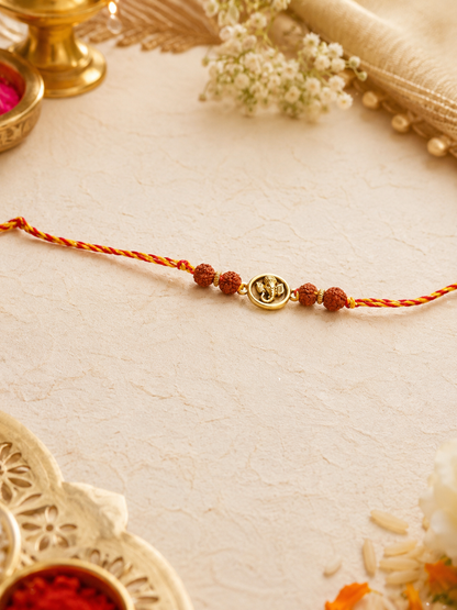 Handmade Lord Ganesha Divine Golden Rakhi with Rudraksha for Raksha Bandhan