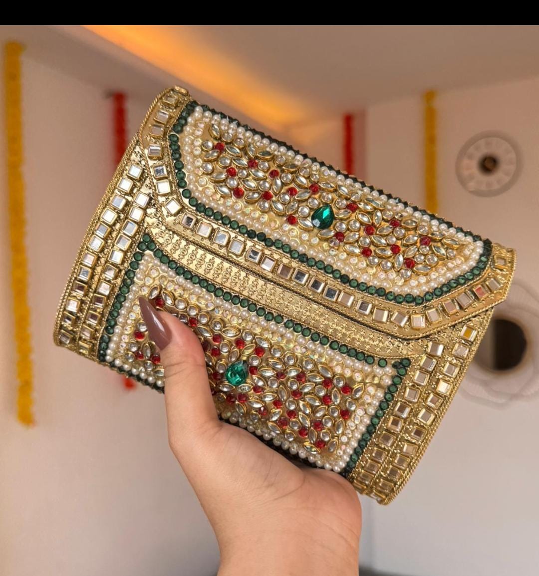 Royal Emerald Brass Heritage Clutch Bag with traditional detailing