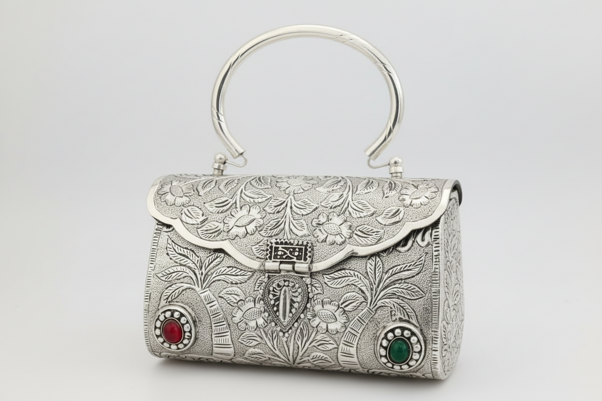 Royal floral brass clutch bag with traditional heritage detailing