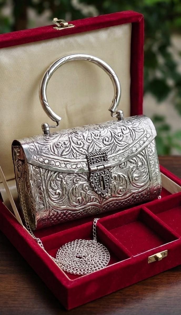 Antique silver brass metal clutch purse with ornate traditional detailing