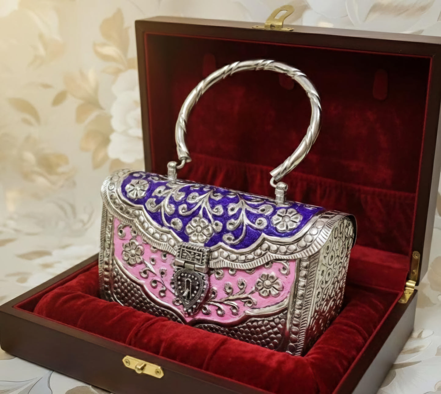 Close-up of Royal Heritage brass clutch with intricate design detailing