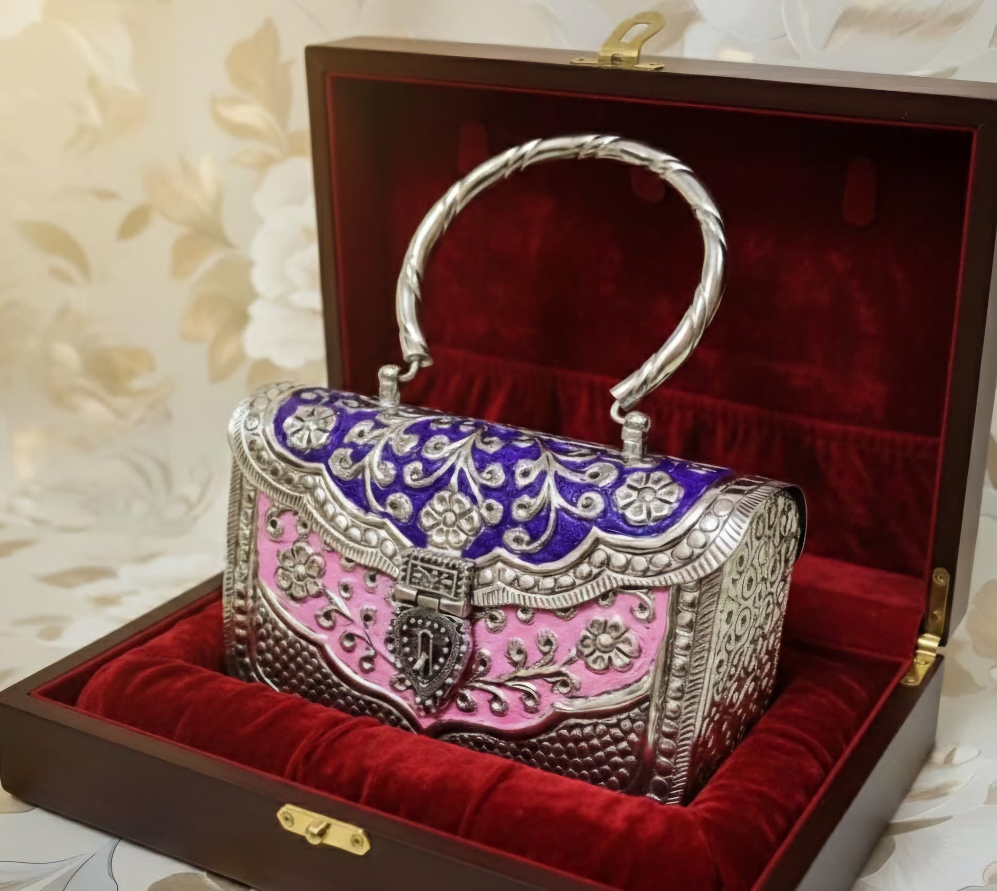Close-up of Royal Heritage brass clutch with intricate design detailing