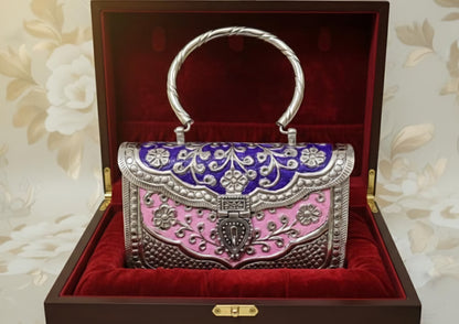 Royal Heritage brass metal clutch with intricate traditional detailing