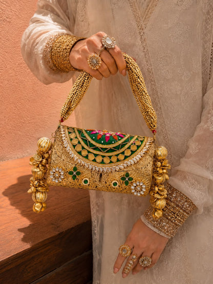 Royal Heritage handcrafted clutch with ornate gold embellishments