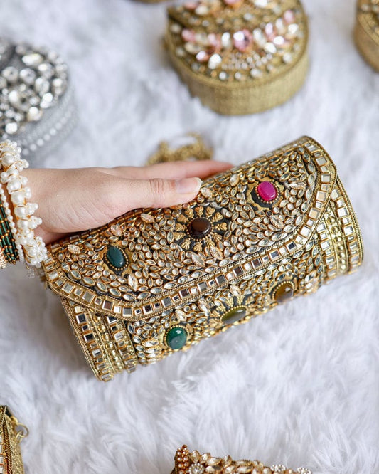 Royal Kundan work brass clutch bag with elegant traditional detailing