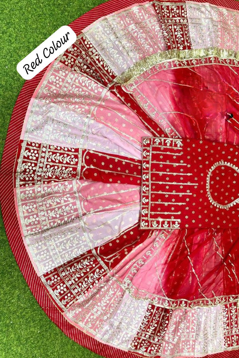 Model wearing royal Rajputi partywear poshak in traditional lehenga style