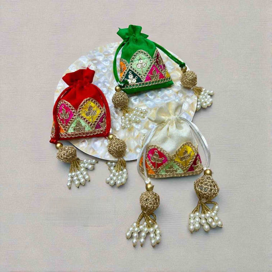 Pack of 10 handcrafted Sagun potli bags in assorted colours for traditional gifting