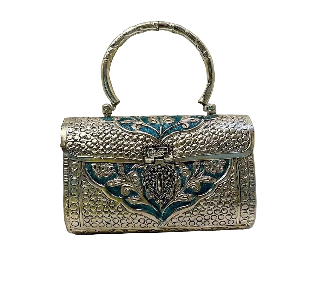 Elegant silver brass metal ethnic clutch with traditional design