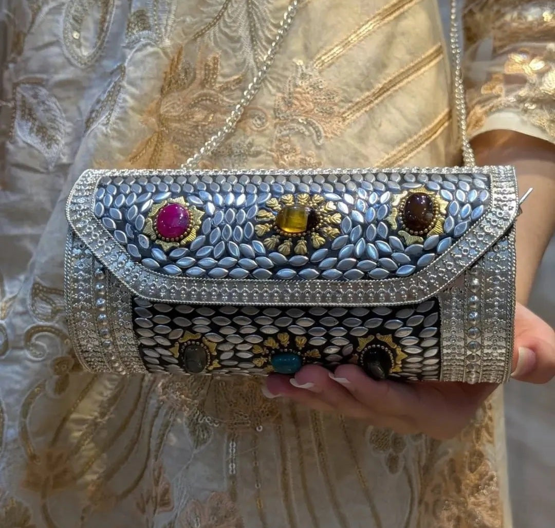 Royal heritage brass clutch bag with elegant traditional detailing