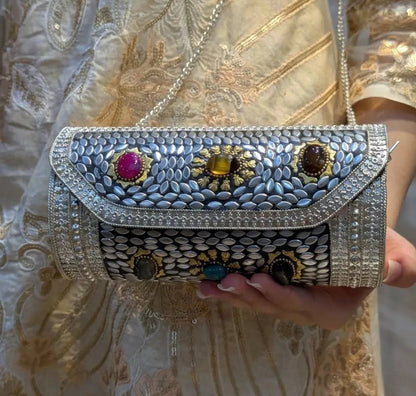 Royal heritage brass clutch bag with elegant traditional detailing