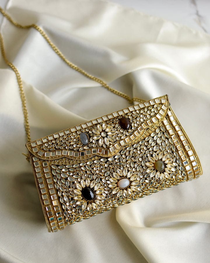 Traditional ethnic designer brass clutch with royal heritage-inspired detailing