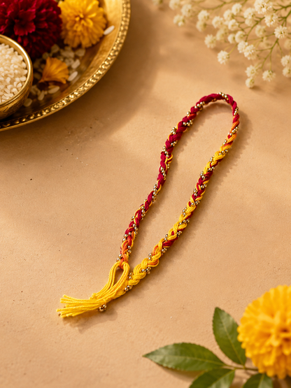 Traditional golden bead Rakhi for brother for Raksha Bandhan