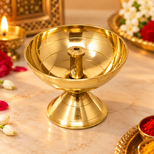 Traditional golden brass diya for pooja and festivals