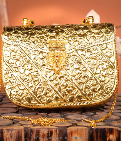 Traditional Indian brass clutch with a sophisticated heritage-inspired look