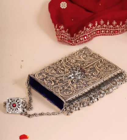 Brass mobile clutch with soft velvet lining and antique finish