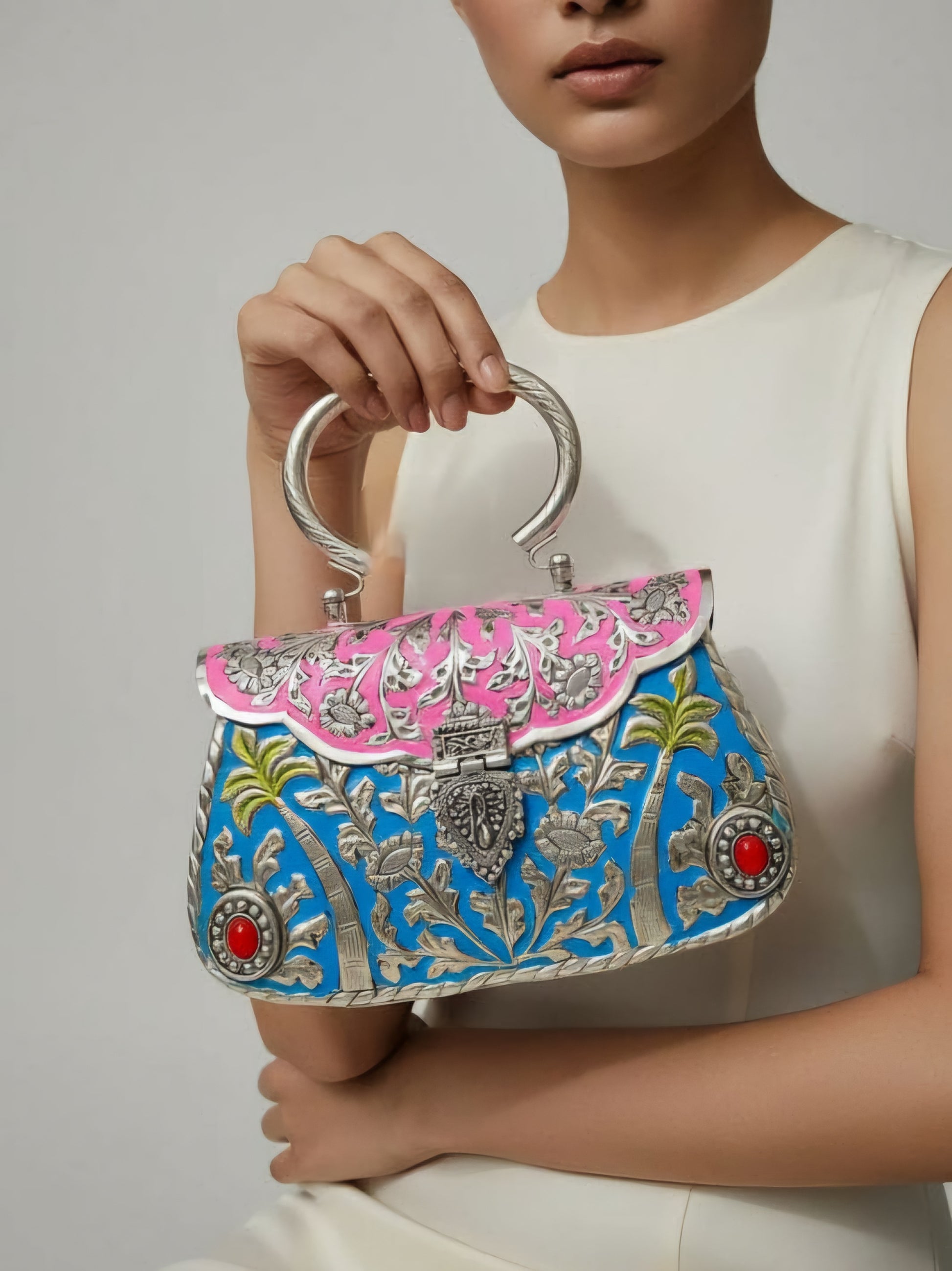 Vintage regal brass clutch bag for women with traditional detailing